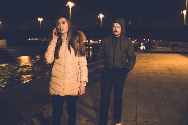 istock Alone woman and the thief 1131171420