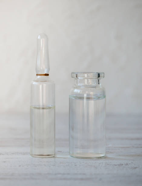 istock Glass ampoules with medication in the table 1131172927