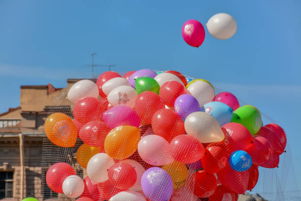 istock Colorful balloons in the blue spring sky. 1131174621