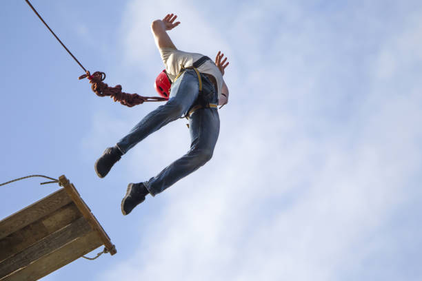 istock Jumping with a rope.Flight down on the rope.Engage in ropejumping.Dangerous hobbies 1131177342