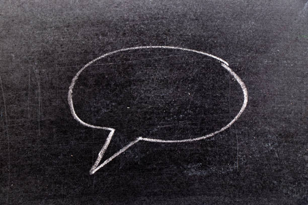 istock White chalk hand drawing in bubble speech shape with blank space for add text on black board background 1131178488