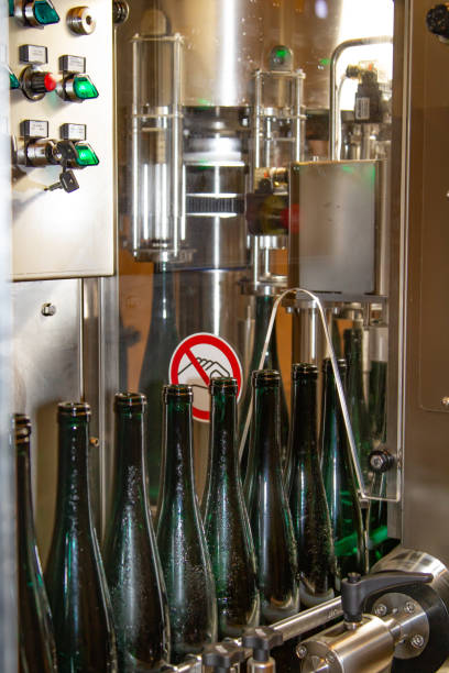 istock in a winery wine gets bottled automatically in a filling station 1131178808