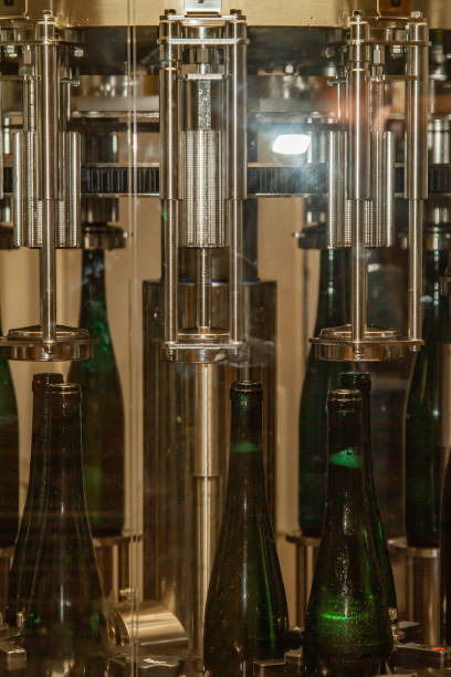 istock in a winery wine gets bottled automatically in a filling station 1131179057