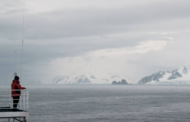Man views at the glacier on the boat, Antarctica