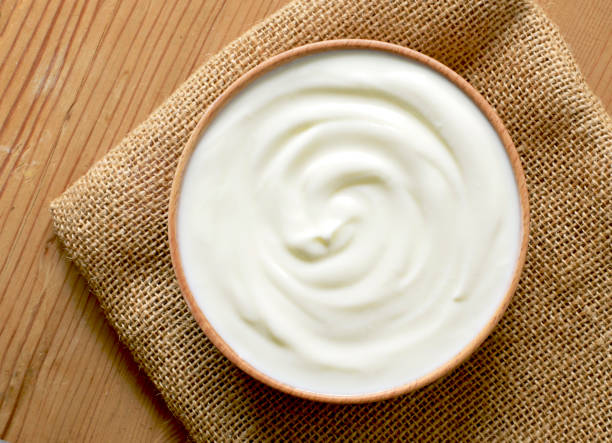 istock Delicious yogurt scene with wooden bowl 1131180749