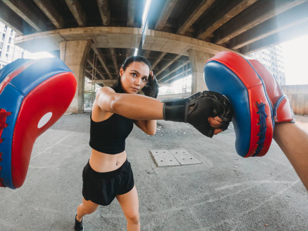 istock Personal perspective of Muay thai fighters training together 1131181636