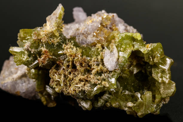 istock Macro Pyromorphite mineral stone on a black background 1131181861