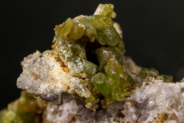 istock Macro Pyromorphite mineral stone on a black background 1131182452