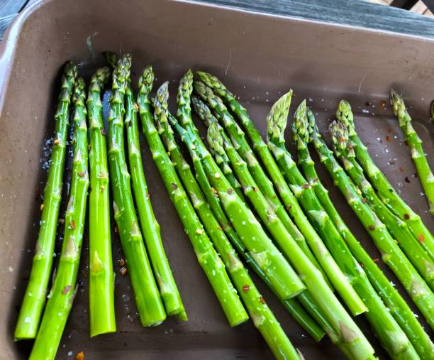 istock Asparagus prepared for cooking on the grill 1131183983