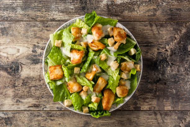 istock Caesar salad with lettuce,chicken and croutons 1131185455