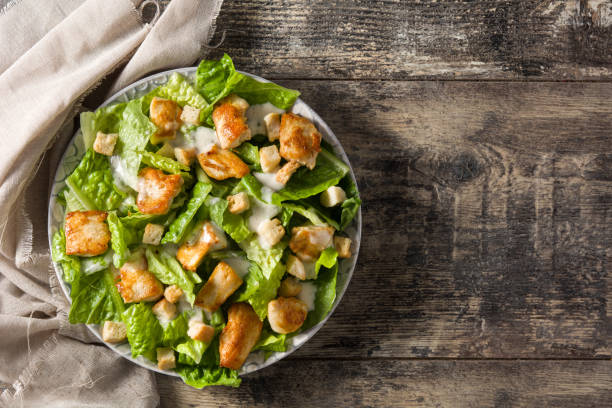istock Caesar salad with lettuce,chicken and croutons 1131185507