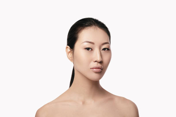 白の背景を持つ若いアジアの女性 - beauty treatment spa treatment health spa human face ストックフォトと画像