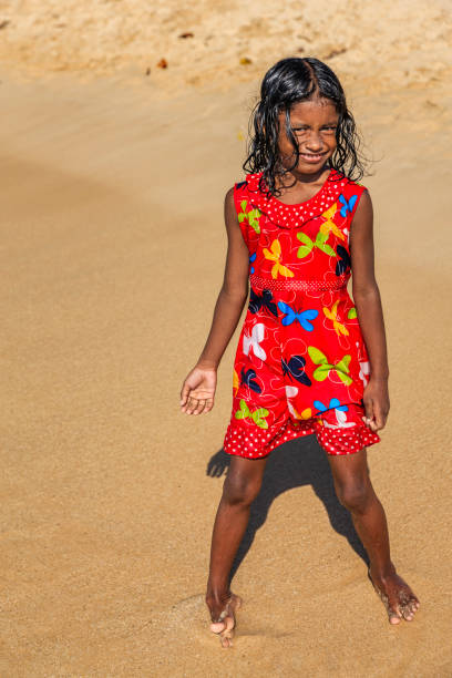 Sri Lankan little girl posing on the beach, Sri Lanka