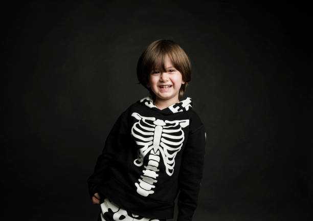 istock Cute baby boy in skeleton costume 1131192540