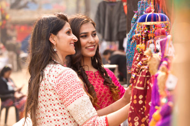 istock Women shopping for souvenirs 1131192808