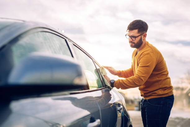 istock Giving the car a good scrub! 1131193935