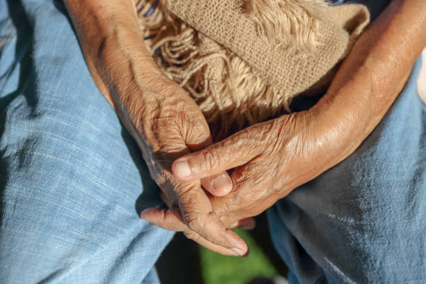 istock Elderly hands on a wheelchair. 1131194062