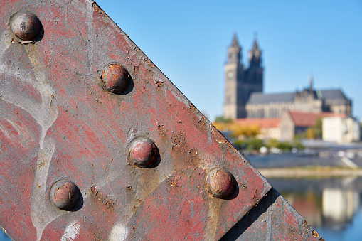 Detail of the lift bridge in Magdeburg. In the background the Magdeburg Cathedral, the landmark of the city.
