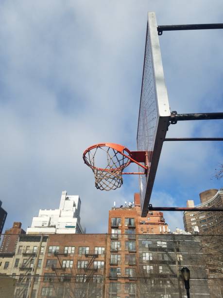 istock Basketball hoop and net and blue sky 1131195513