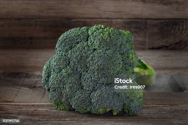 Fresh Broccoli On Wooden Background Stock Photo - Download Image Now - Abstract, Agriculture, Broccoli