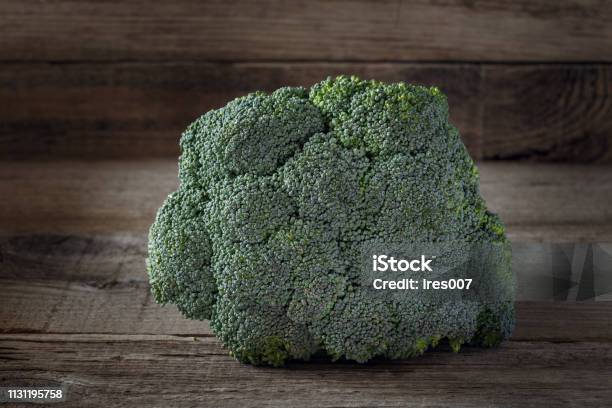 Fresh Broccoli On Wooden Background Stock Photo - Download Image Now - Abstract, Agriculture, Broccoli