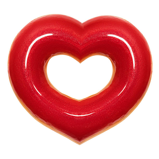 istock Donut red heart shape with red glaze front view isolated white background with clipping path. Donut Valentines day. Concept love is glazed doughnut sweet food 1131196892