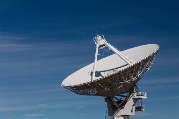 istock Very Large Array radio satellite dish antenna isolated against a deep blue sky 1131201712