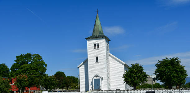 istock white woden church in Norway 1131201907