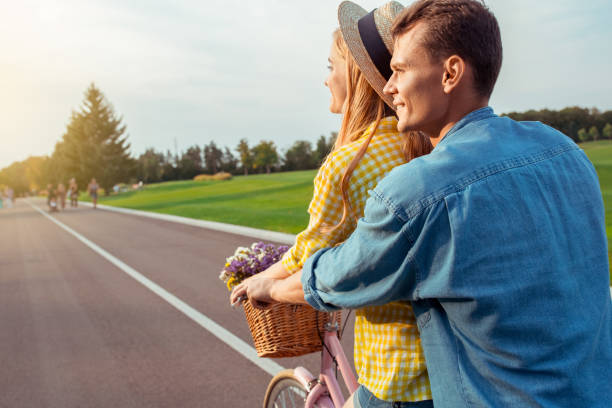 istock Couple riding bicycle together active lifestyle concept 1131202010