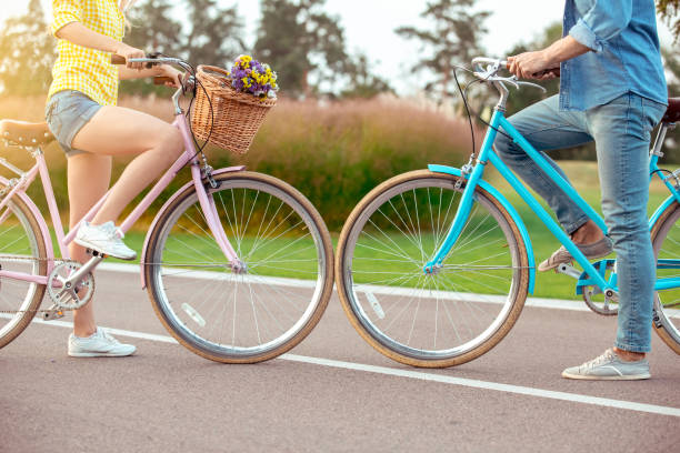 istock Couple riding bicycle together active lifestyle concept 1131202037