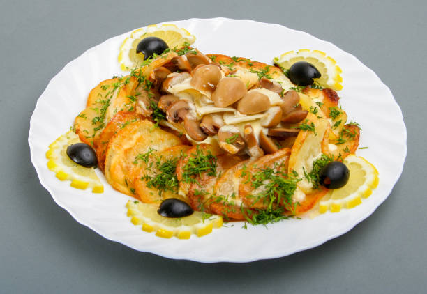 istock Meat baked with vegetables and mushrooms. 1131202895