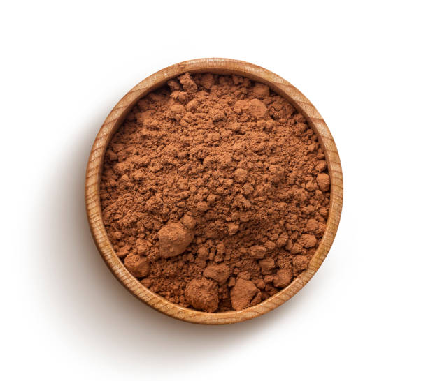 Cocoa powder isolated on white background. Top view Cacao. Pile of cocoa powder in wooden bowl isolated on white background, top view cocoa powder stock pictures, royalty-free photos & images