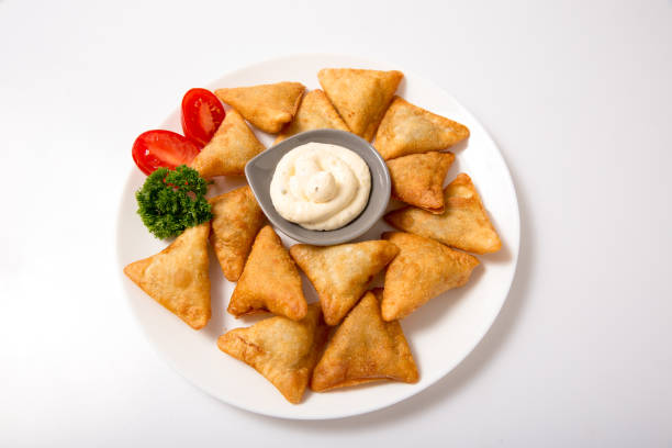 Dumplings with meat on a plate.