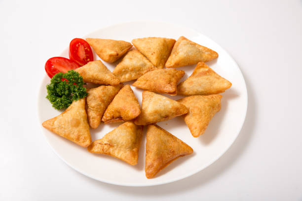 Dumplings with meat on a plate.