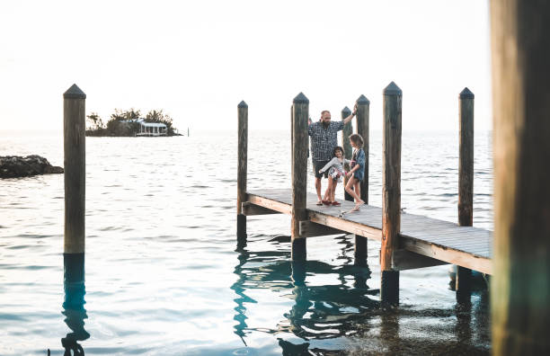 istock Kids on a dock in the Florida Keys 1131205085
