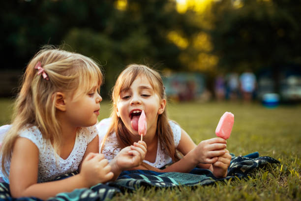 istock Life is better with sister and ice cream! 1131206612