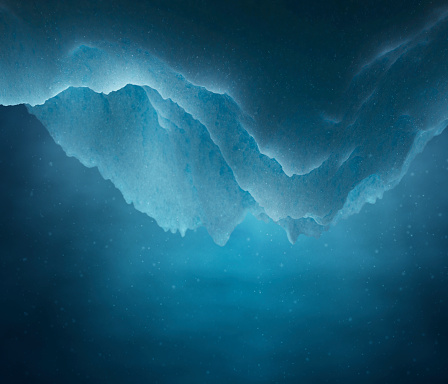 Underwater ice scene with vivid blue light, DOF.