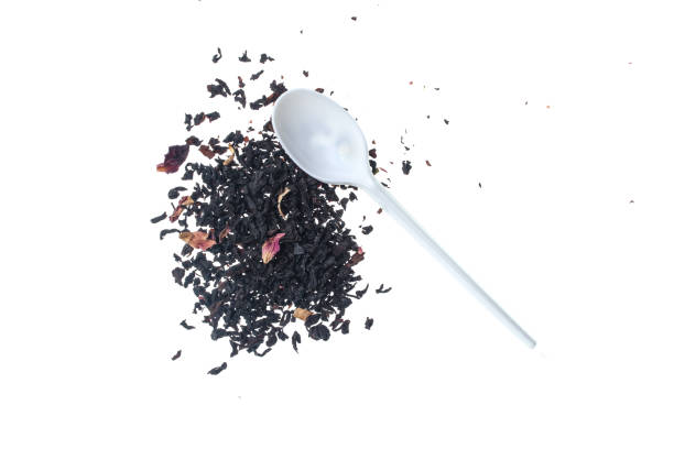 istock Leaf dry tea and spoon isolated on white background. 1131207207