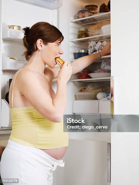 Pregnant Woman Eating Sandwich Stock Photo - Download Image Now - Pregnant, Eating, Ham