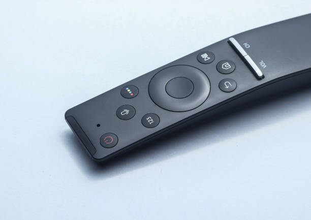 istock Close up tv remote on gray background. 1131216332