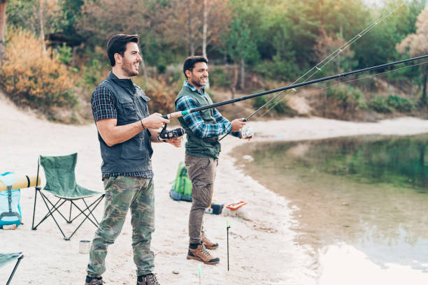 istock Two men fishing together 1131216429