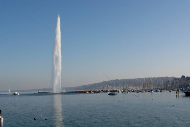 istock Jet d'Eau fountain at sunset, Geneva  Switzerland 1131221079