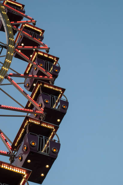 istock Ferris wheel in the evening lighting 1131221838