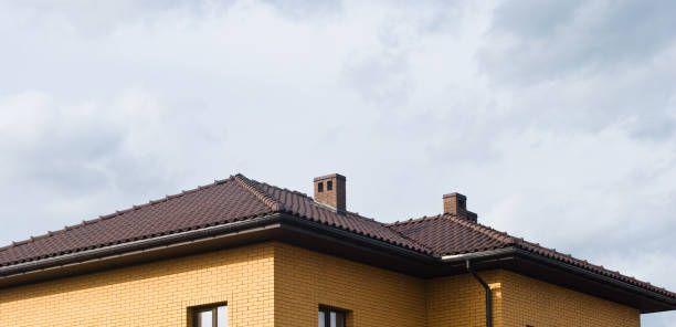 istock Tiled Metal Roof On House 1131225552