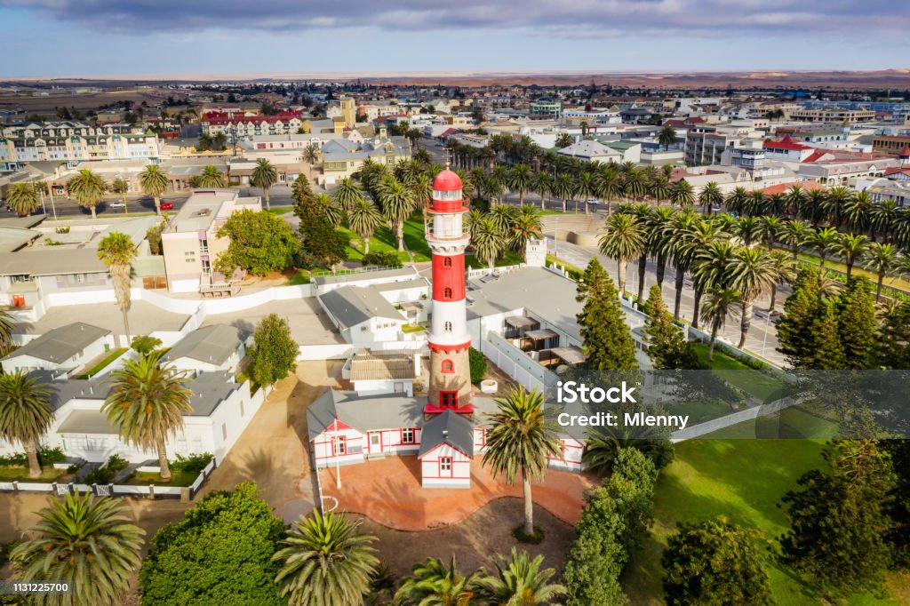 Swakopmund Cityscape with Lighthouse Aerial View Namibia Aerial view of Swakopmund Town Center with famous colonial Swakopmund Lighthouse. Drone point of view. Swakopmund, Namibia, Africa Swakopmund Stock Photo