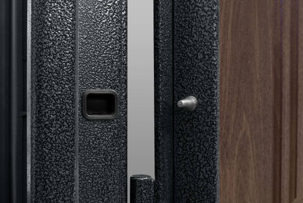 istock Hinge On Dark Blue Metal Door 1131230882