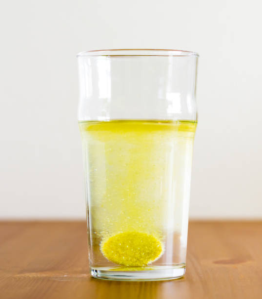 istock Effervescent tablet and glass of water. Vitamin beverage. 1131233263