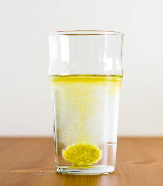 istock Effervescent tablet and glass of water. Vitamin beverage. 1131233277