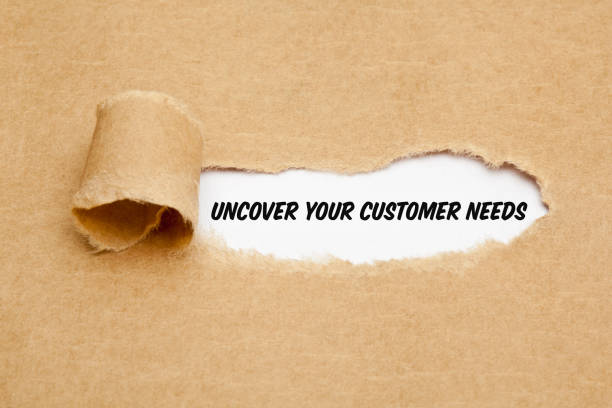 Uncover Your Customer Needs Business Concept Text Uncover Your Customer Needs appearing behind torn paper. Concept about the importance to understand the demands, requirements and expectations of your clients. weakness stock pictures, royalty-free photos & images