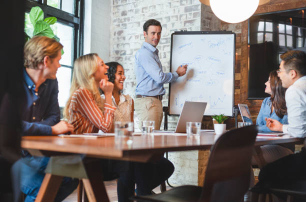 istock Business people watching a presentation on the whiteboard. 1131235883